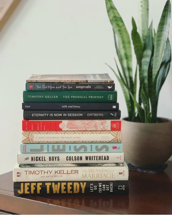 A curated stack of books